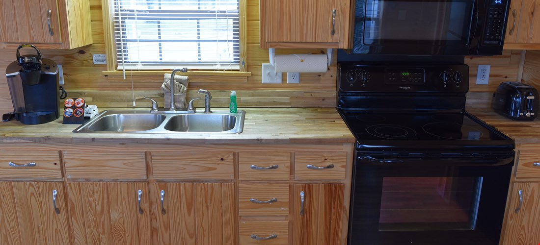 Kitchenette in a family deluxe cabin